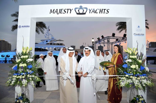 Qatar's Minister of Culture, Dr. Hamad Abed Al Aziz Al Kuwari with the Chairman of Gulf Craft Mohammed  Alshaali at the grand opening in 2013.