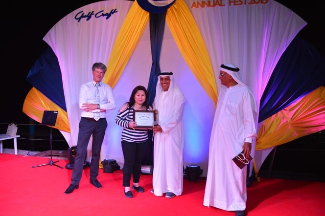 From R-L:  Dr. Hamdan Alshamsi member of the Board of Directors, Mohammed Alshaali Chairman, Harriet Vitasa Chairman's Award recipient and Erwin Bamps CEO during the Chairman's Award ceremony.
