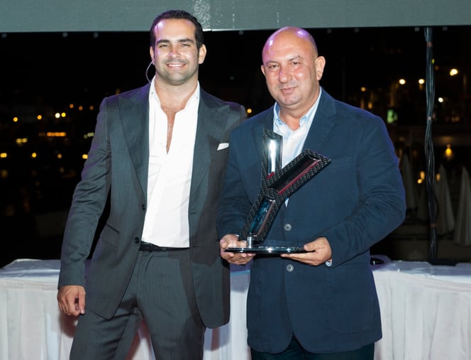 Sam Richomme (left), Group CEO & Publisher of LuxMedia Group handed over the "Shipyard of the Year" award to Notis Menelaou (right), Sales Manager of Gulf Craft