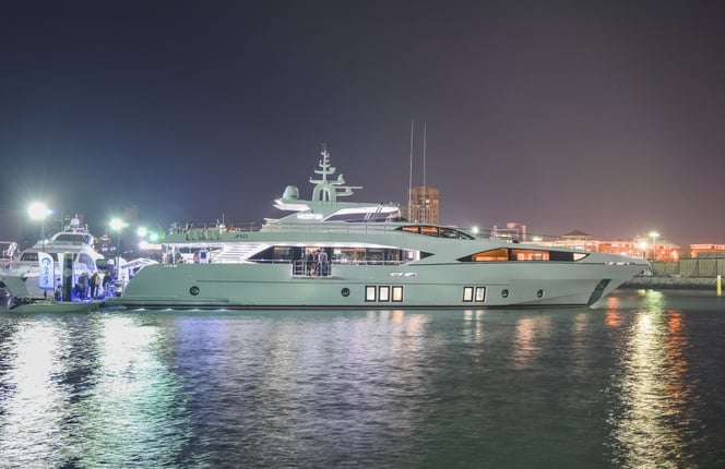 Night shot of the Majesty 122 at the Kuwait Yacht Show