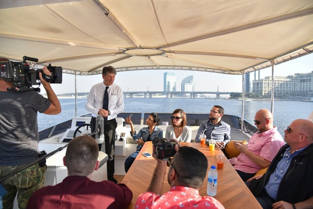 CEO Erwin Bamps speaks to the press during the Dubai Canal Media Cruise.jpg