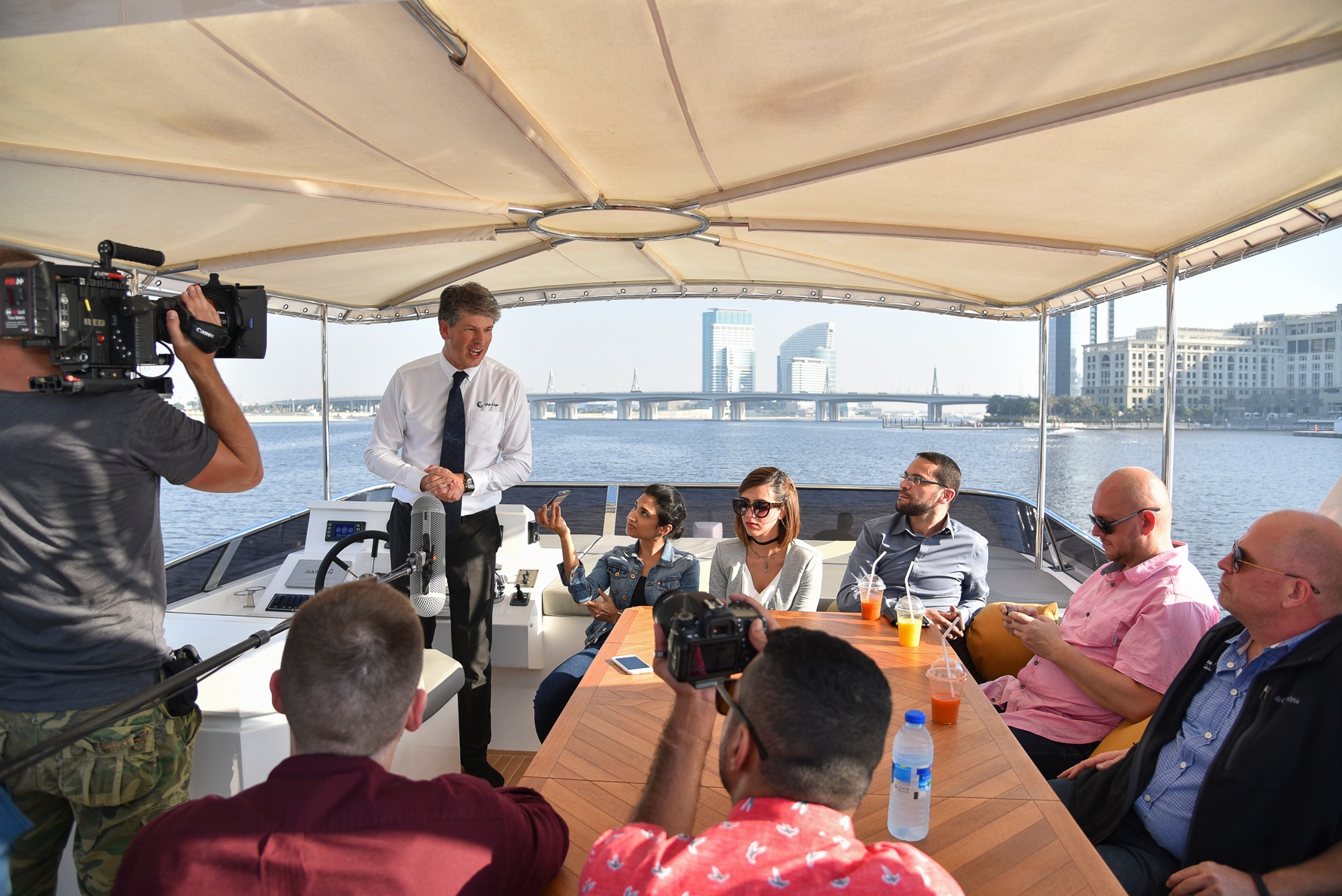CEO Erwin Bamps speaks to the press during the Dubai Canal Media Cruise.jpg